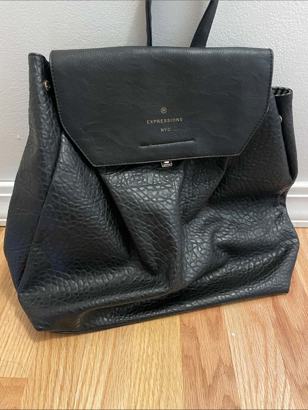 Expressions Black Textured Faux Leather Backpack